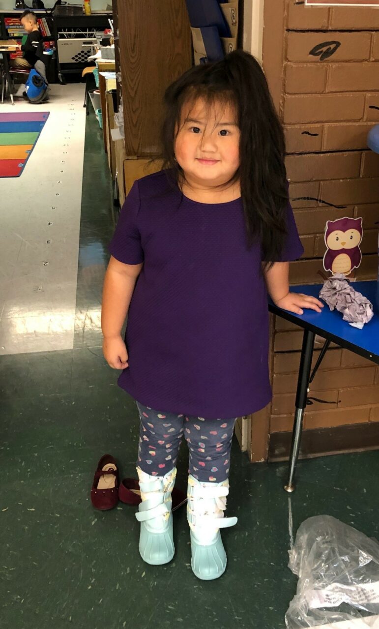 girl in snow boots