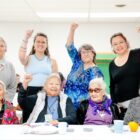Native elders celebrating together at community wellness event supported by Running Strong Healthy Elder Box program