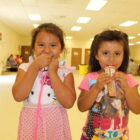 Native children enjoy nutritious snacks during the Summer Youth Feeding Program on the Cheyenne River Sioux Reservation