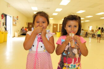 Native children enjoy nutritious snacks during the Summer Youth Feeding Program on the Cheyenne River Sioux Reservation