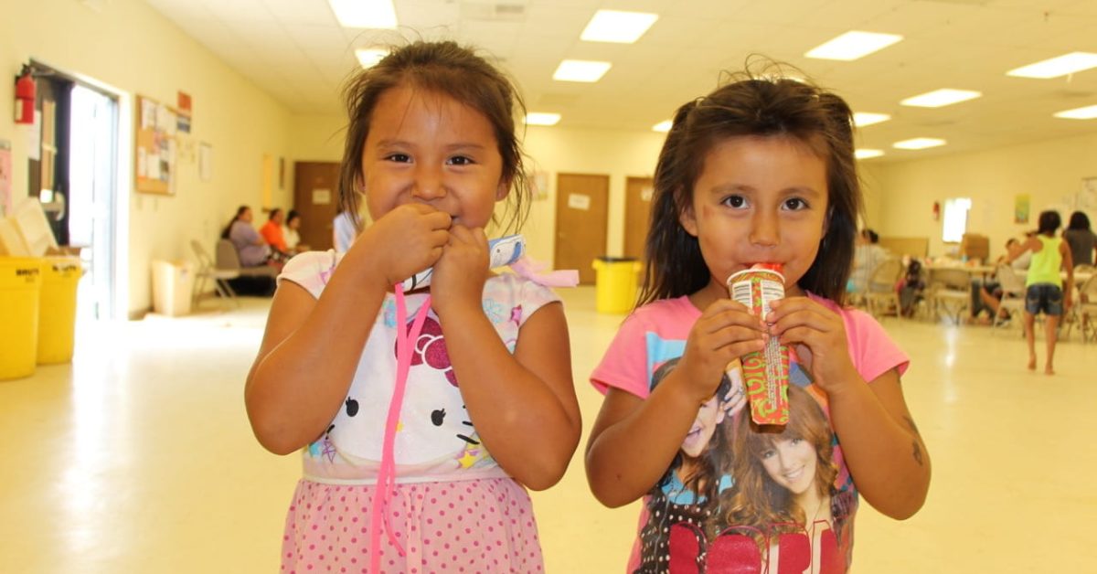 Native children enjoy nutritious snacks during the Summer Youth Feeding Program on the Cheyenne River Sioux Reservation